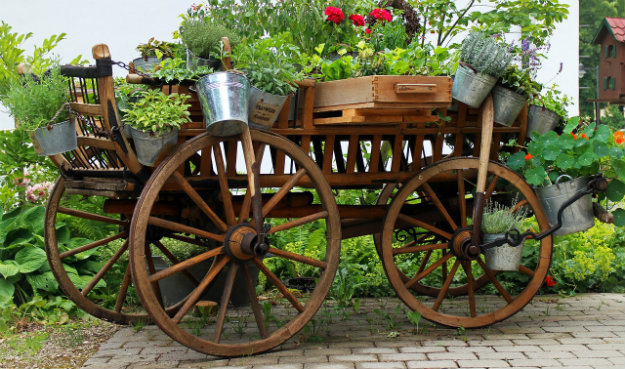 Unusual Garden Ornaments - old cart displayed with pot plants